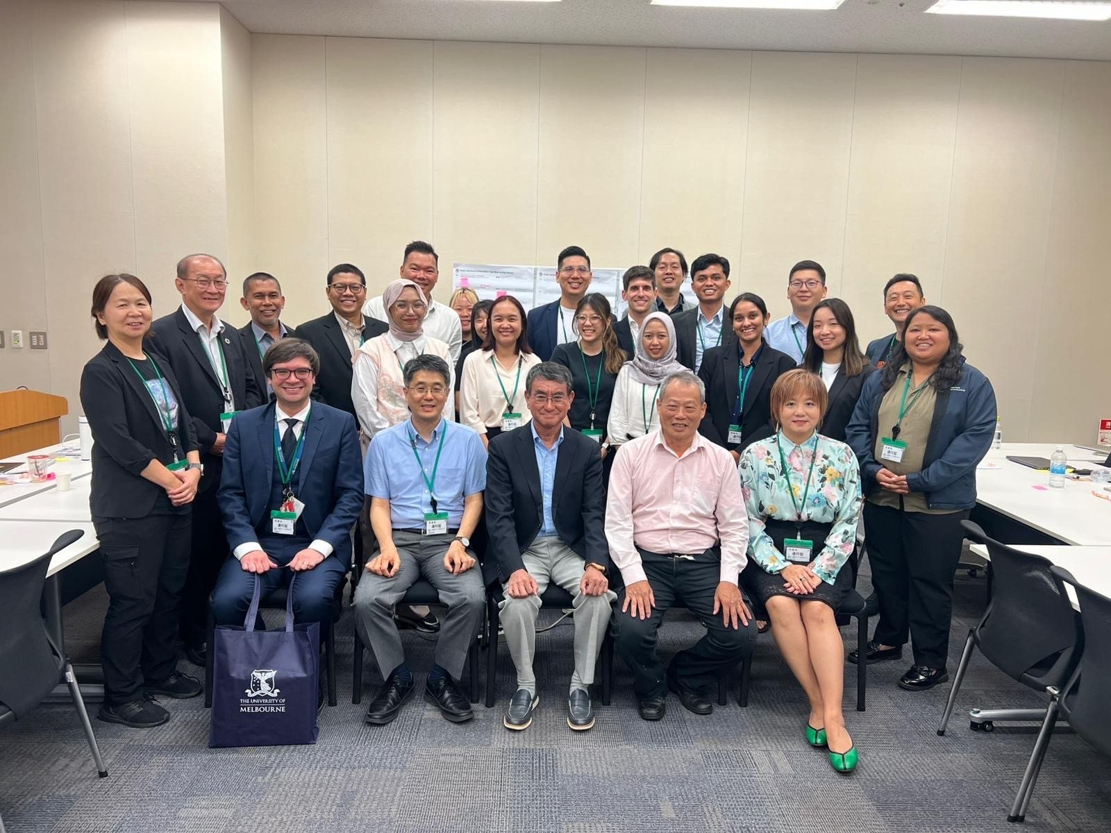 Group photo of the Tokyo workshop in the Diet members' office building, September 2025