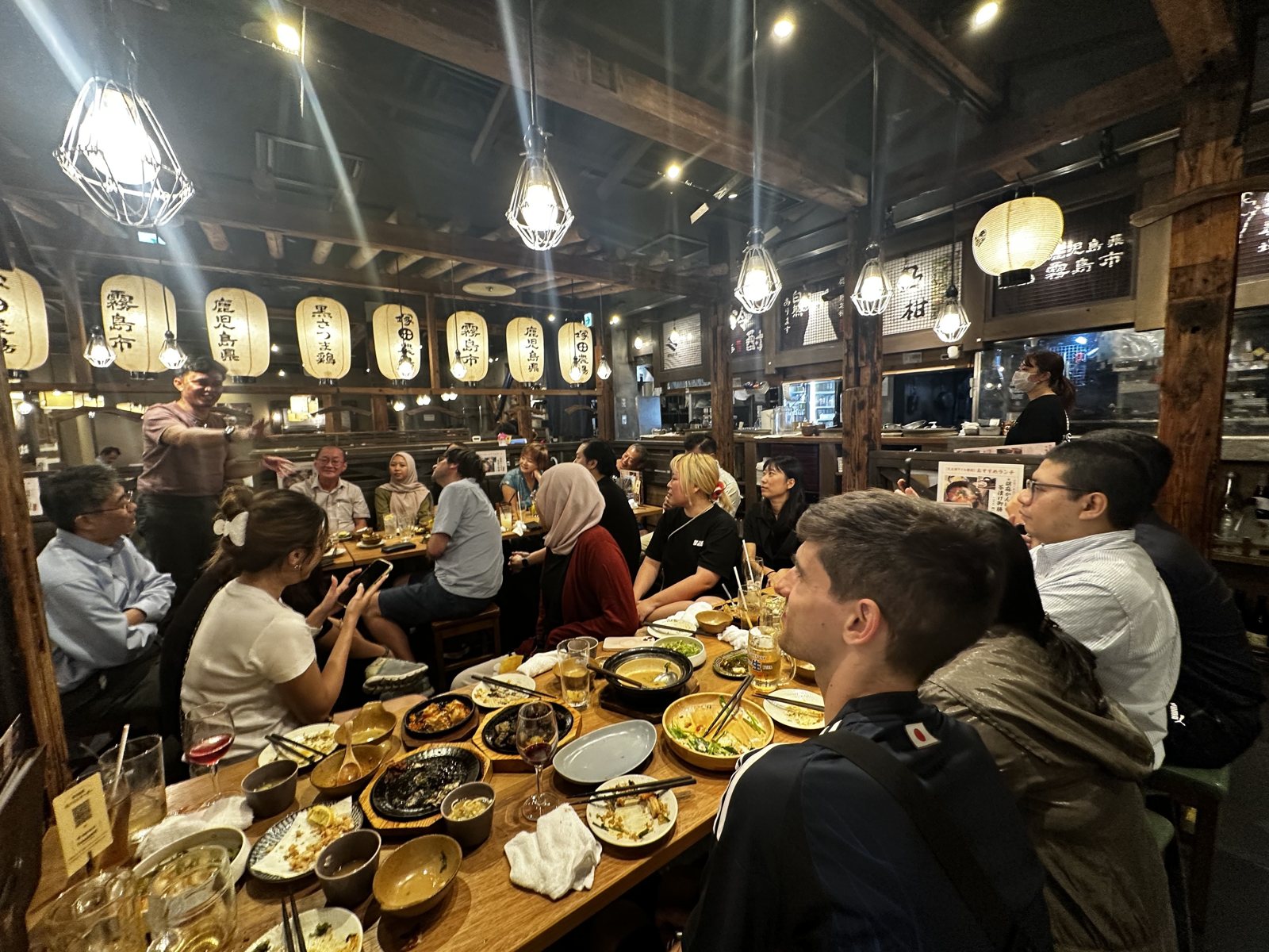 Workshop participants at dinner in a Tokyo izakaya, September 2025